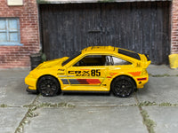 2026 Hot Wheels 1985 Honda CR-X yellow JJJ51 loose car, left-side view