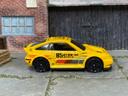 2026 Hot Wheels 1985 Honda CR-X yellow JJJ51 loose car, right-side view