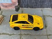 2026 Hot Wheels 1985 Honda CR-X yellow JJJ51 loose car, top view