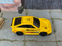 2026 Hot Wheels 1985 Honda CR-X yellow JJJ51 loose car, top view