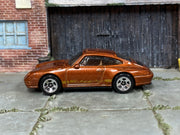 2026 Hot Wheels '96 Porsche Carrera metalflake root beer JJJ59 loose car, left-side view