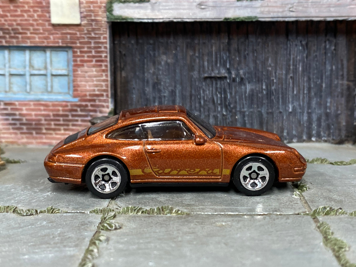 2026 Hot Wheels '96 Porsche Carrera metalflake root beer JJJ59 loose car, right-side view
