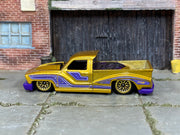 Hot Wheels 2026 Bounce'n Bass gold left-side view
