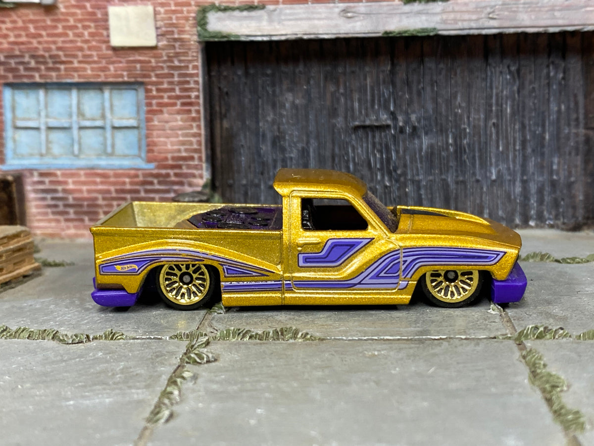 Hot Wheels 2026 Bounce'n Bass gold right-side view