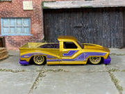 Hot Wheels 2026 Bounce'n Bass gold right-side view