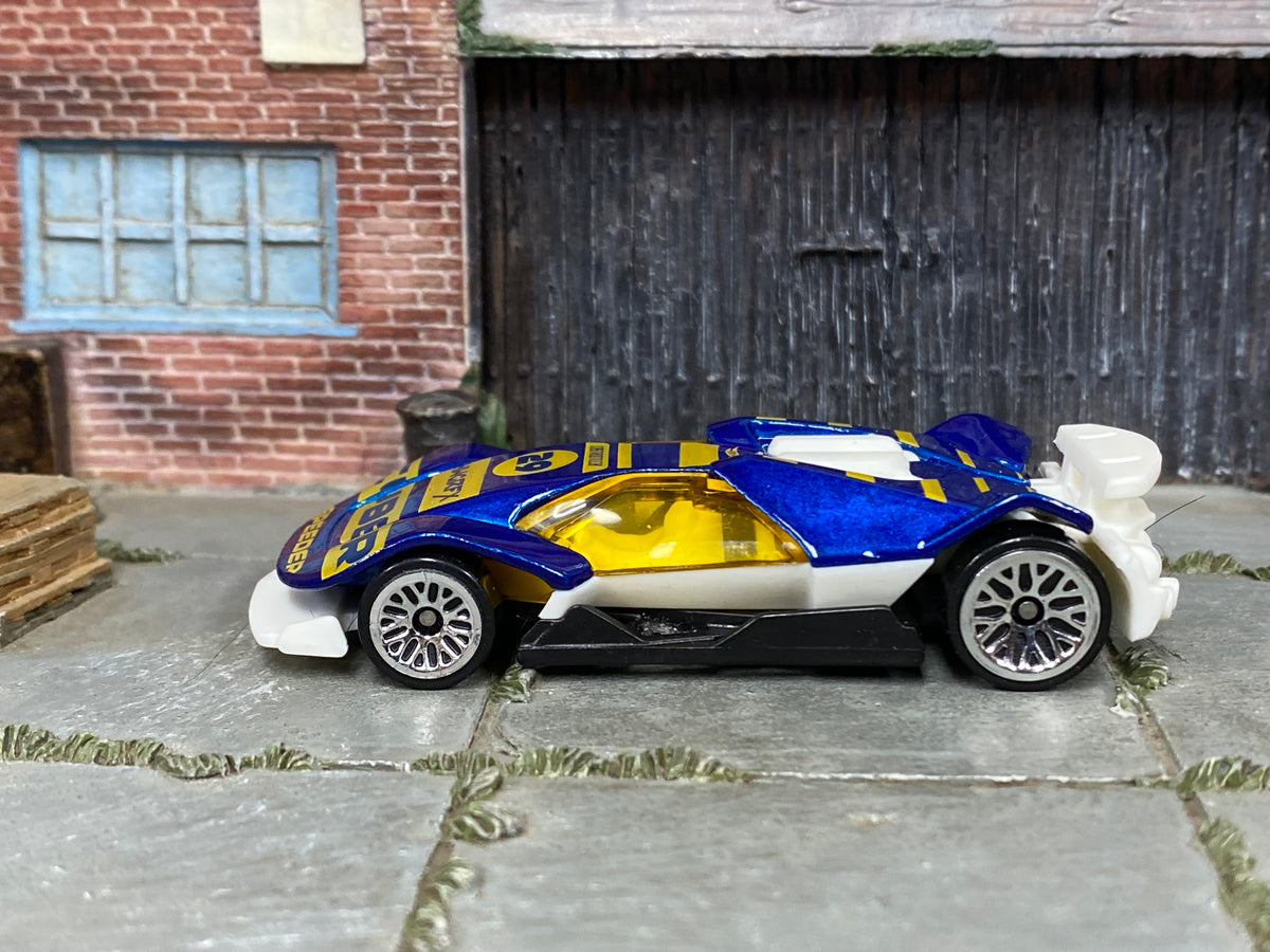 2026 Hot Wheels Cyber Speeder navy blue and gold number 29 loose car, right-side view