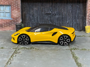 2026 Hot Wheels Lotus Emira Hethel Yellow multipack loose car, left-side view