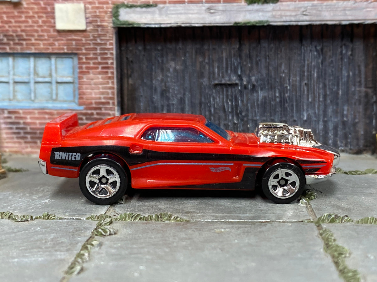 Hot Wheels 2026 Rivited red HW Torque right-side view
