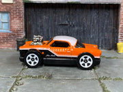 2026 Hot Wheels The Nash orange with white roof loose car, left-side view