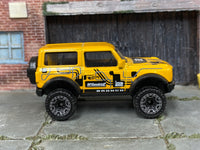Hot Wheels '21 Ford Bronco metallic yellow number 2, right side view