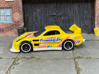 Hot Wheels 24/Seven yellow International Friendship Day, left side view
