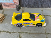 Hot Wheels 24/Seven yellow International Friendship Day, top view