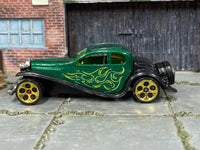 Hot Wheels ’37 Bugatti metallic green yellow flames loose car, left side view
