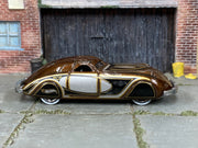 Hot Wheels '38 Phantom Corsair metallic brown, silver and gold loose car, right side view