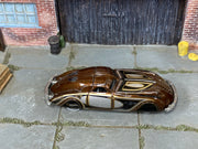 Hot Wheels '38 Phantom Corsair metallic brown, silver and gold loose car, top view