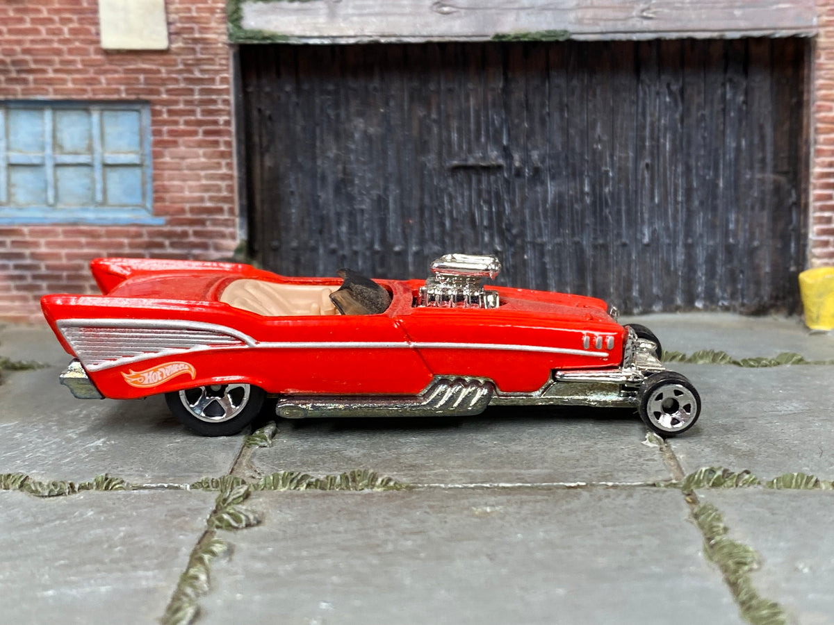 Hot Wheels '57 Roadster red and silver with five-spoke front wheels, right side view