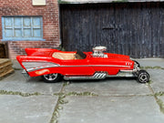 Hot Wheels '57 Roadster red and silver loose car, right side view
