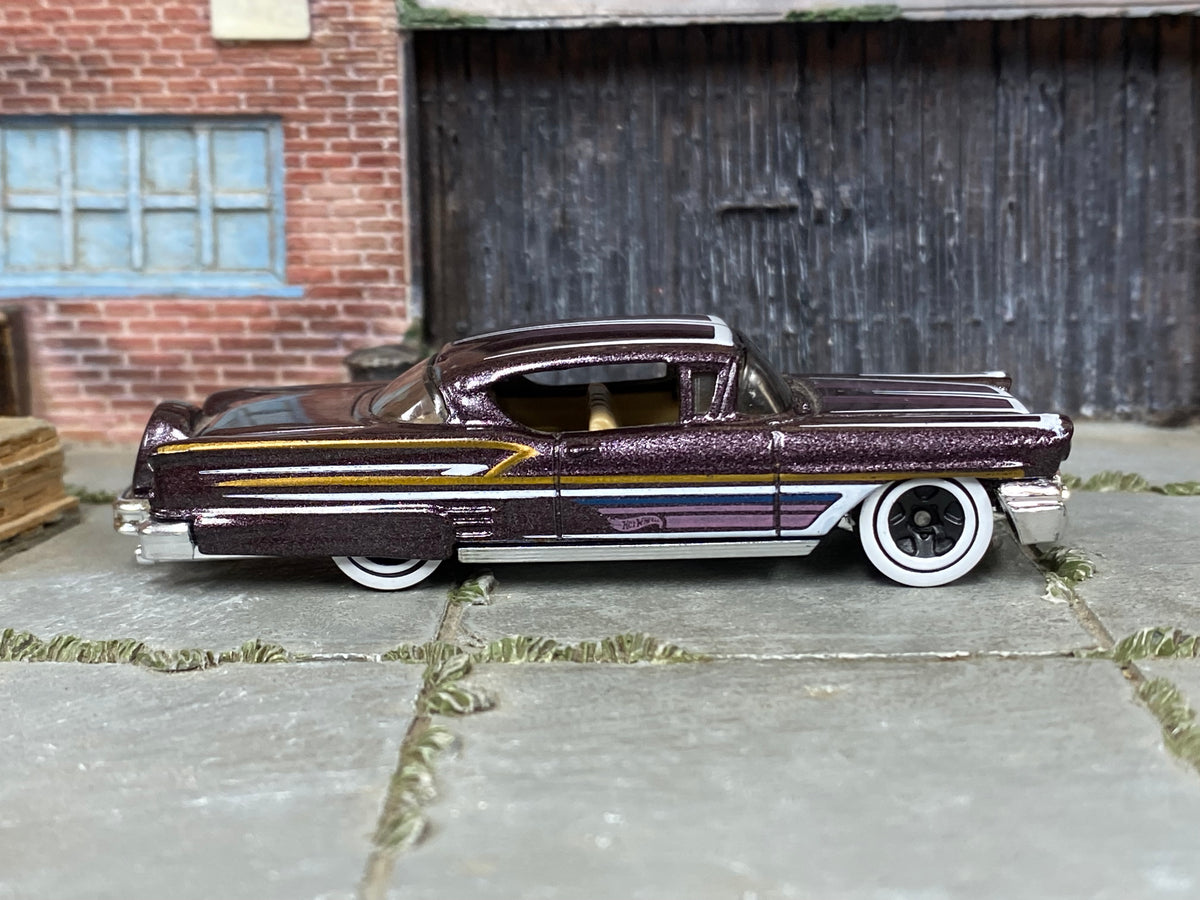 Hot Wheels '58 Impala dark purple with white scallops and whitewall wheels, right side view