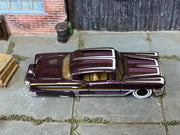 Hot Wheels '58 Impala dark purple with white scallops and whitewall wheels, top view