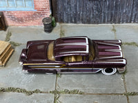 Hot Wheels '58 Impala dark purple with white scallops and whitewall wheels, top view