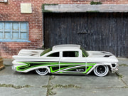 Hot Wheels '59 Chevy Impala white with green and black graphics, right side view