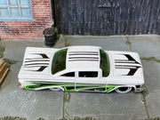 Hot Wheels '59 Chevy Impala white with green and black graphics, top view