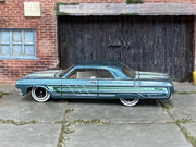 Hot Wheels '64 Impala metallic teal loose car — left side view