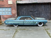 Hot Wheels '64 Impala metallic teal loose car — right side view