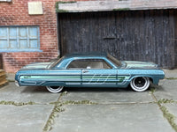 Hot Wheels '64 Impala metallic teal loose car — right side view