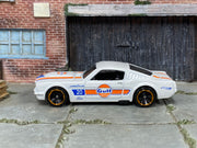 Hot Wheels '65 Mustang 2+2 Fastback white Gulf #20, left-side view