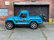 Hot Wheels '67 Jeepster Commando — left-side view