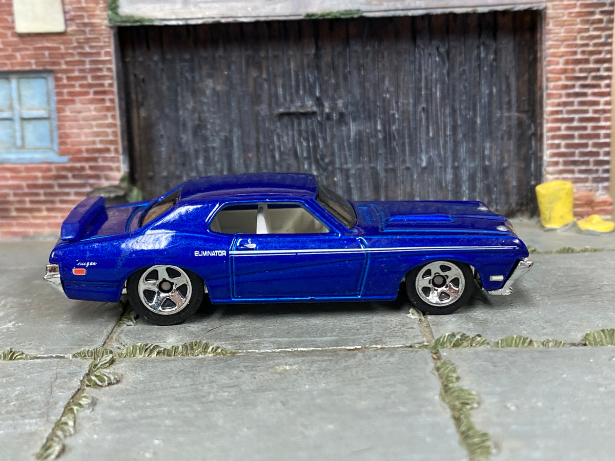 Hot Wheels ’69 Mercury Cougar Eliminator in blue with white stripes — right side view
