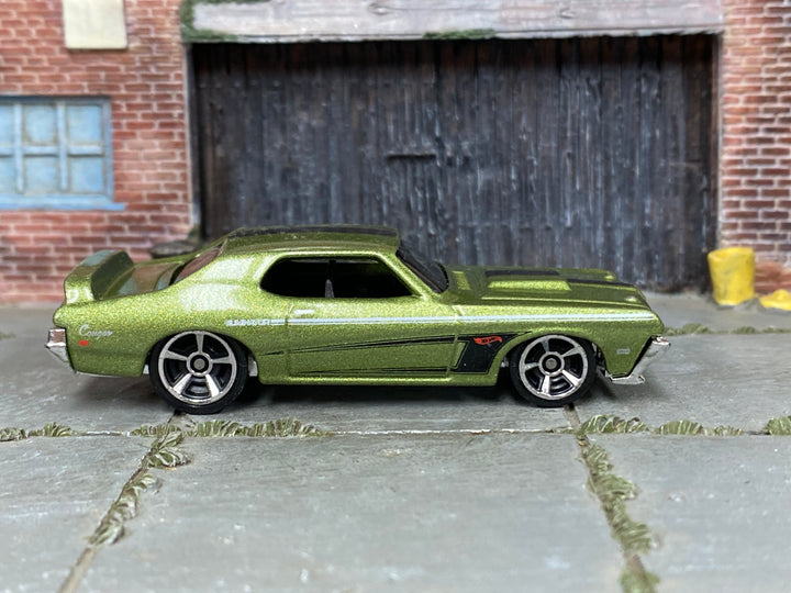 Hot Wheels '69 Mercury Cougar Eliminator metallic olive green loose car, right side view