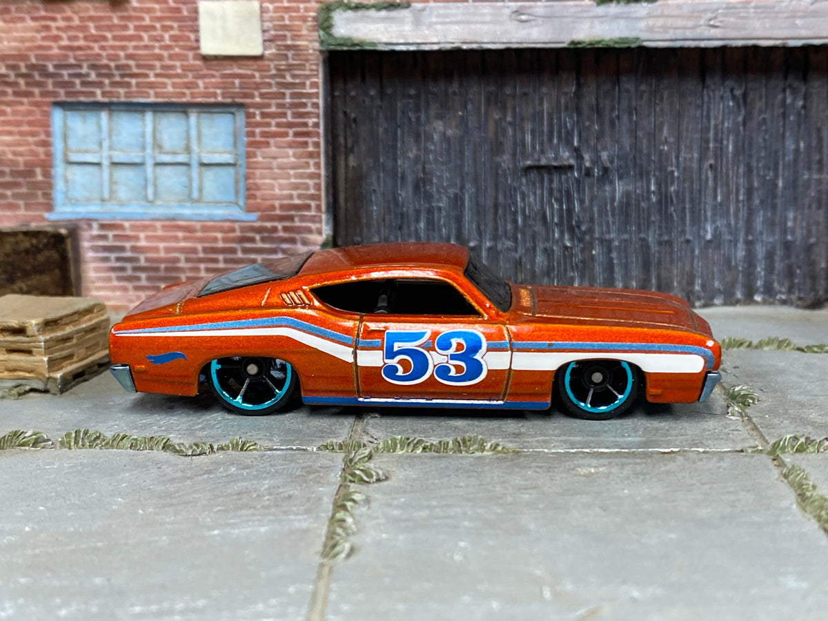 Hot Wheels '69 Ford Torino Talladega orange number 53 loose car, right-side view