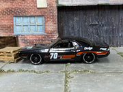 Hot Wheels '70 Dodge Hemi Challenger, black number 70, left side view