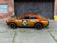 Hot Wheels '70 Ford Escort RS1600 metallic rootbeer number 70, left side view