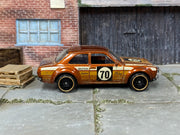 Hot Wheels '70 Ford Escort RS1600 metallic rootbeer number 70, right side view