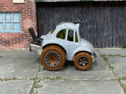 Hot Wheels ’70 Volkswagen Baja Bug gray with brown wheels — right side view