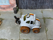 Hot Wheels ’70 Volkswagen Baja Bug gray with brown wheels — top view