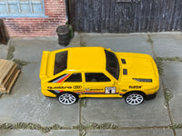 Hot Wheels '84 Audi Sport quattro yellow number 1, top view