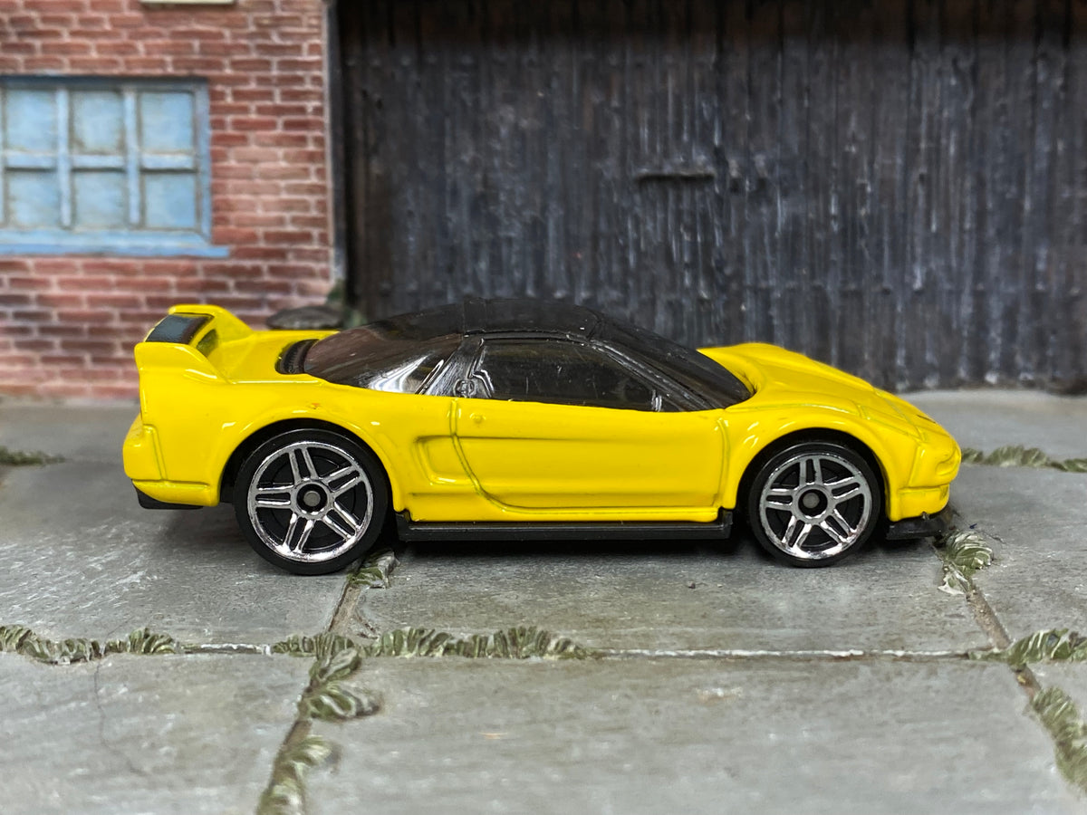 Hot Wheels ’90 Acura NSX yellow with silver wheels — right side view