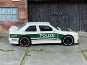 Hot Wheels ’92 BMW M3 white and green Polizei — right side view