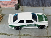 Hot Wheels ’92 BMW M3 white and green Polizei — top view
