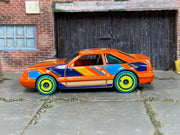 Hot Wheels '92 Ford Mustang orange Art Cars loose car, left side view