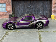 Hot Wheels '97 Corvette purple with black silver and gold graphics — left side view
