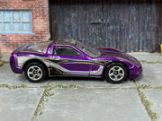 Hot Wheels '97 Corvette purple with black silver and gold graphics — right side view