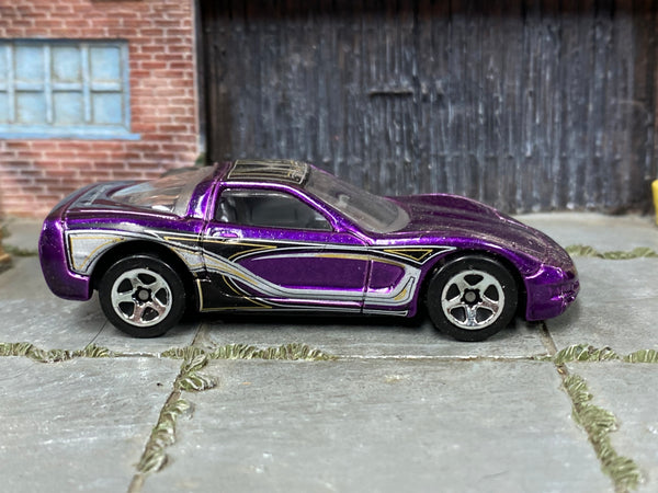 Hot Wheels '97 Corvette purple with black silver and gold graphics — right side view