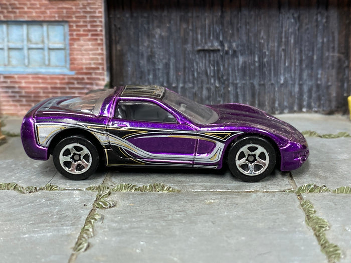 Hot Wheels '97 Corvette purple with black silver and gold graphics — right side view