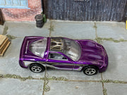 Hot Wheels '97 Corvette purple with black silver and gold graphics — top view