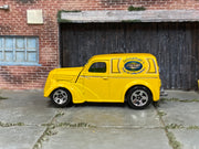Hot Wheels Anglia Panel Truck yellow Express Delivery loose vehicle, left side view